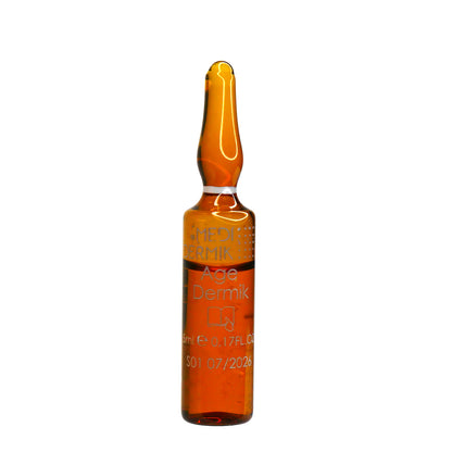 Amber glass bottle with a dropper on a white background