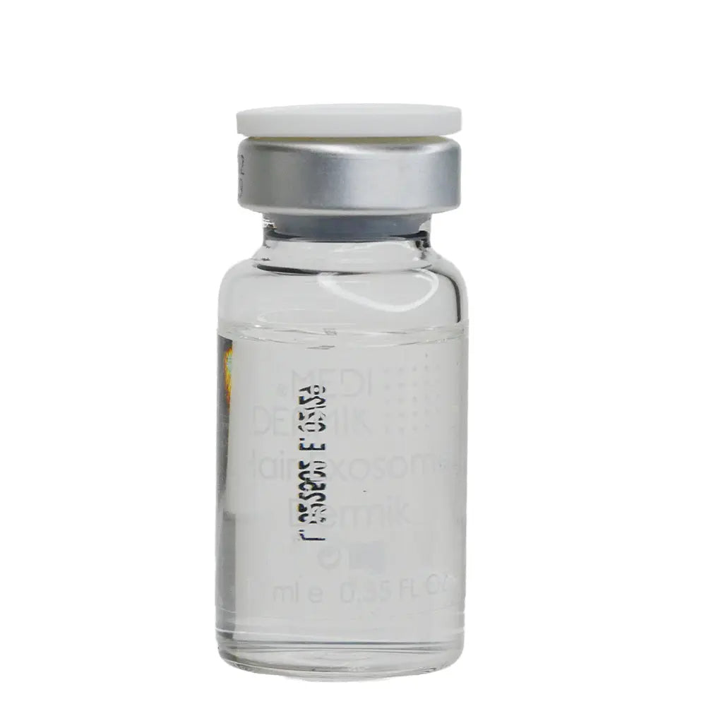 Clear glass vial with silver cap on a white background